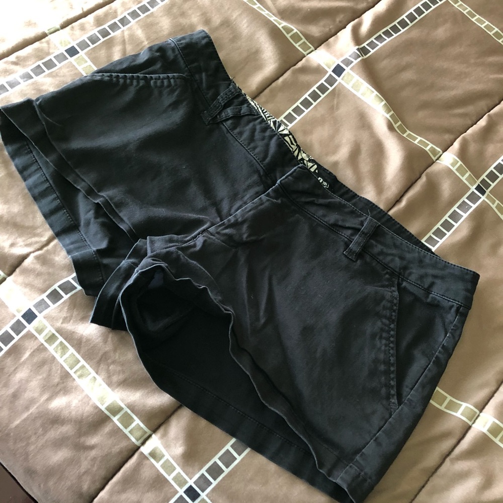 Volcom size 28 black shorts. Super comfy!